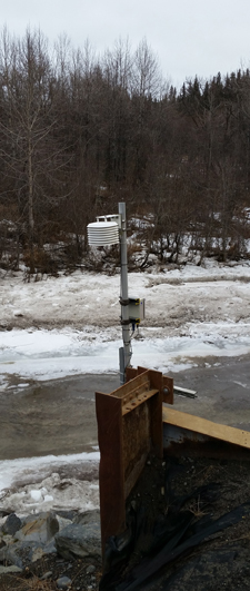 Modern sensors, such as this one (at left) along the Anchor River, monitor weather and river conditions. The information uploads to satellites.-Photos by Shana Loshbaugh