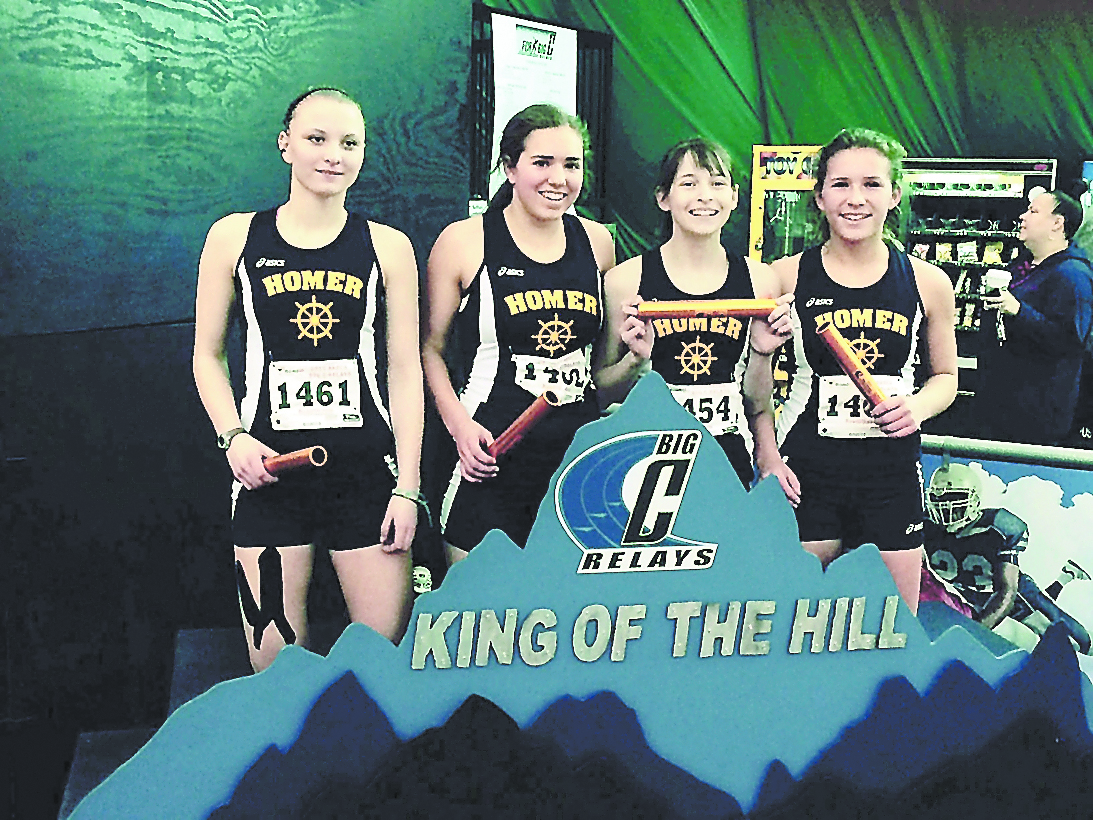 The Homer Mariners 800-meter spring medley team pose after taking seventh place in a field of 29 teams at the Big C Relays in Anchorage last weekend.  From left are athletes Ziza Shemet Pitcher, Aurora Waclawski, Alex Mosley and Sarah Wolf.  -Photo Provided