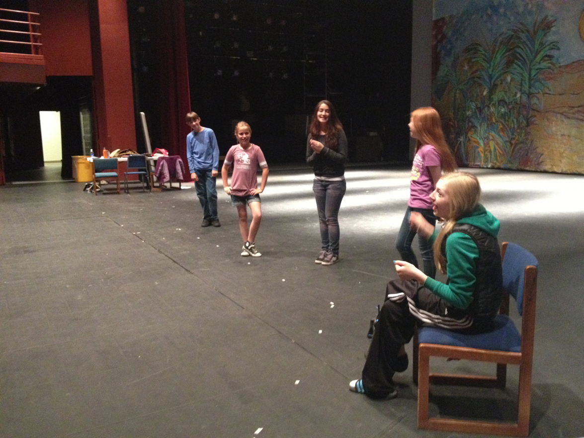 Pier One Youth Theatre actors, from left to right, Landon Bunting, Chloe Allman, Chloe Pleznac, Lilly Smith and Mia Alexson practice a scene from “The More You Know.” -Photo provided