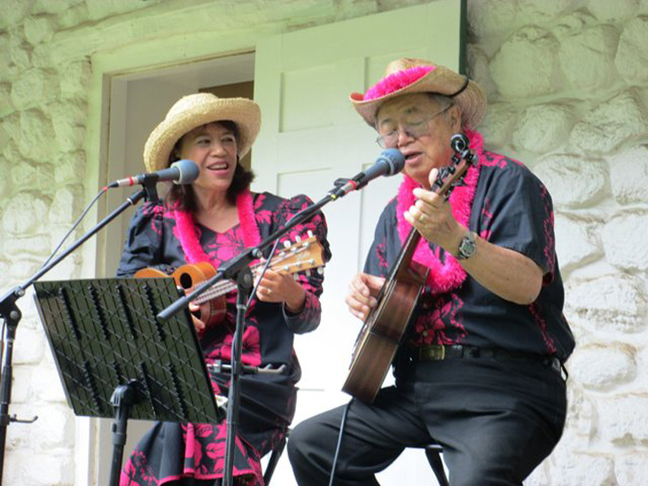 Mele Fong, left, and Richard Tom, right, of The Hawaiian Serenaders, Maui, Hawaii, perform and teach in Homer this weekend.-Photo provided