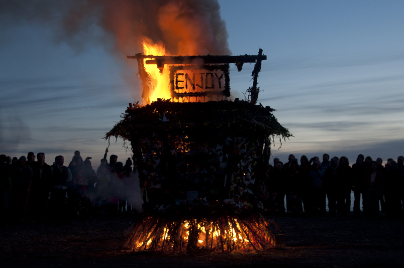 The 10th annual Burning Basket celebration glows bright against Sunday’s darkening sky.-Photo by Heather Ericson, special to the Homer News