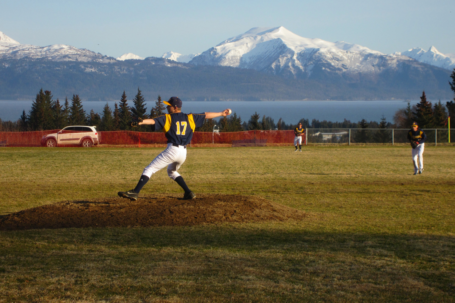 Kyle Johnson pitches the win during the Mariners’ opening game of the season on their home turf. The Mariners defeated Kenai Central 10-2.-Photo by Wendy Wayne