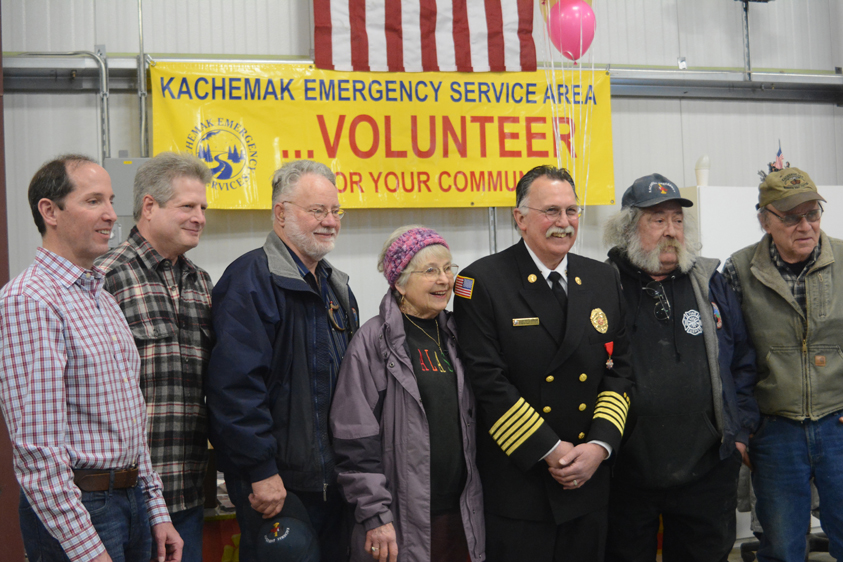 Kenai Peninsula Borough Mayor Mike Navarre, far left, poses with past and current Kachemak Emergency Services board members at an open house Jan. 31 for the new Diamond Ridge Fire Station. From left to right are Navarre, Dave Bachrach, Pat Johnson, Milli Martin, KES Chief Bob Cicciarella, Matt Schneyer and Jeff Middleton.