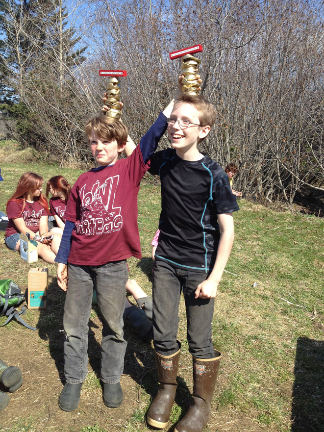 Lukyan Dax, 10, and Calvin Anderson,14, celebrate the distinction of being HoWL’s “Dirtiest DiRtBaGs” of 2014, each picking up more than 100 bags of trash during Cleanup Week in 2014. HoWL’s Cleanup week starts Monday and coincides with the community cleanup day on May 2.-Photo provided