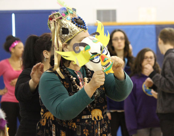 Bonnie Pierce of Project GRAD leads a Chinese dragon dance during Ninilchik School’s rehearsal for a World Culture celebration.-Photo by McKibben Jackinsky, Homer News