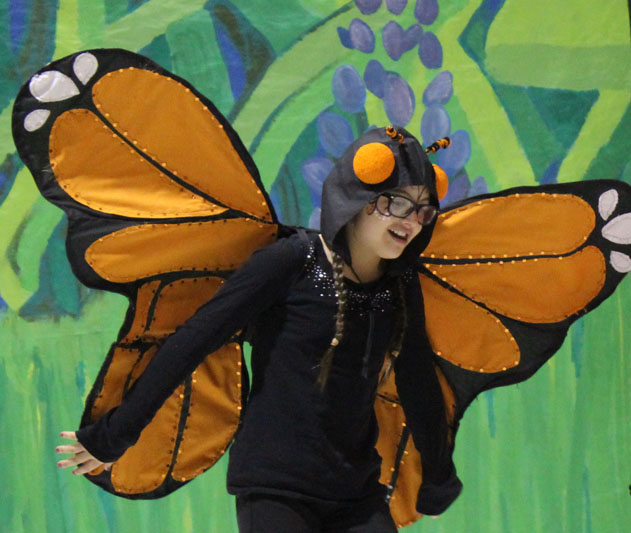 Sailey Rhodes spreads her wings as a Monarch butterfly.-McKibben Jackinsky, Homer News