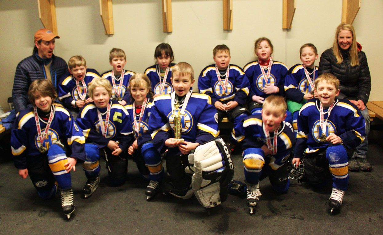 Showing off their medals are back row, left to right: Coach Shaun Hatton, Ethan Styvar, Zane Barth, Leilani salisan, Jamen Anderson, Dale Bryant, Tanner Clyde, Assistant Coach Michelle Hatton; and, front row, left to right: Marley Malcolm, Seamus Hatton, Jordan Barrowcliff, Makary Reutov, Carter woodhead, CJ Burns. Not pictured: Head Coach Dylan Braund, player Finn Braund and manager Lisa Bryant. Not pictured: Head Coach Dylan Braund, player Finn Braund and manager Lisa Bryant.-Photo provided