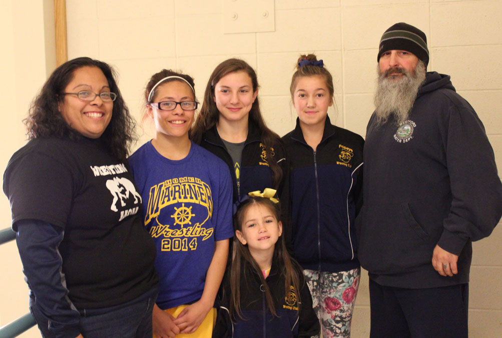 Five Popeye Wrestling Club girls and their coaches are headed to the Pre-Season National War of the Roses girls-only wrestling tournament later this month including Coach Janie Martin, Jadzia Martin, Mina Cavasos, McKenzie Cook and Coach Todd Cook. In front is wrestler Saoirse Cook. Not pictured: wrestler Allison Wells. -Photo by McKibben Jackinsky, Homer News