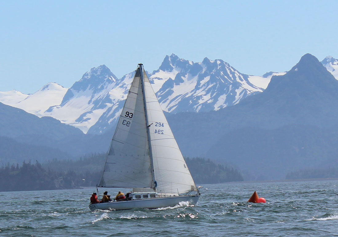The Arctica is the first boat across the starting line in the Sunday portion of the Homer Yacht Club-Land’s End Resort Regatta. The Arctica, with Captain Craig Forrest of Homer, was the overall winner of the two-day event.-Photo by McKibben Jackinsky, Homer News