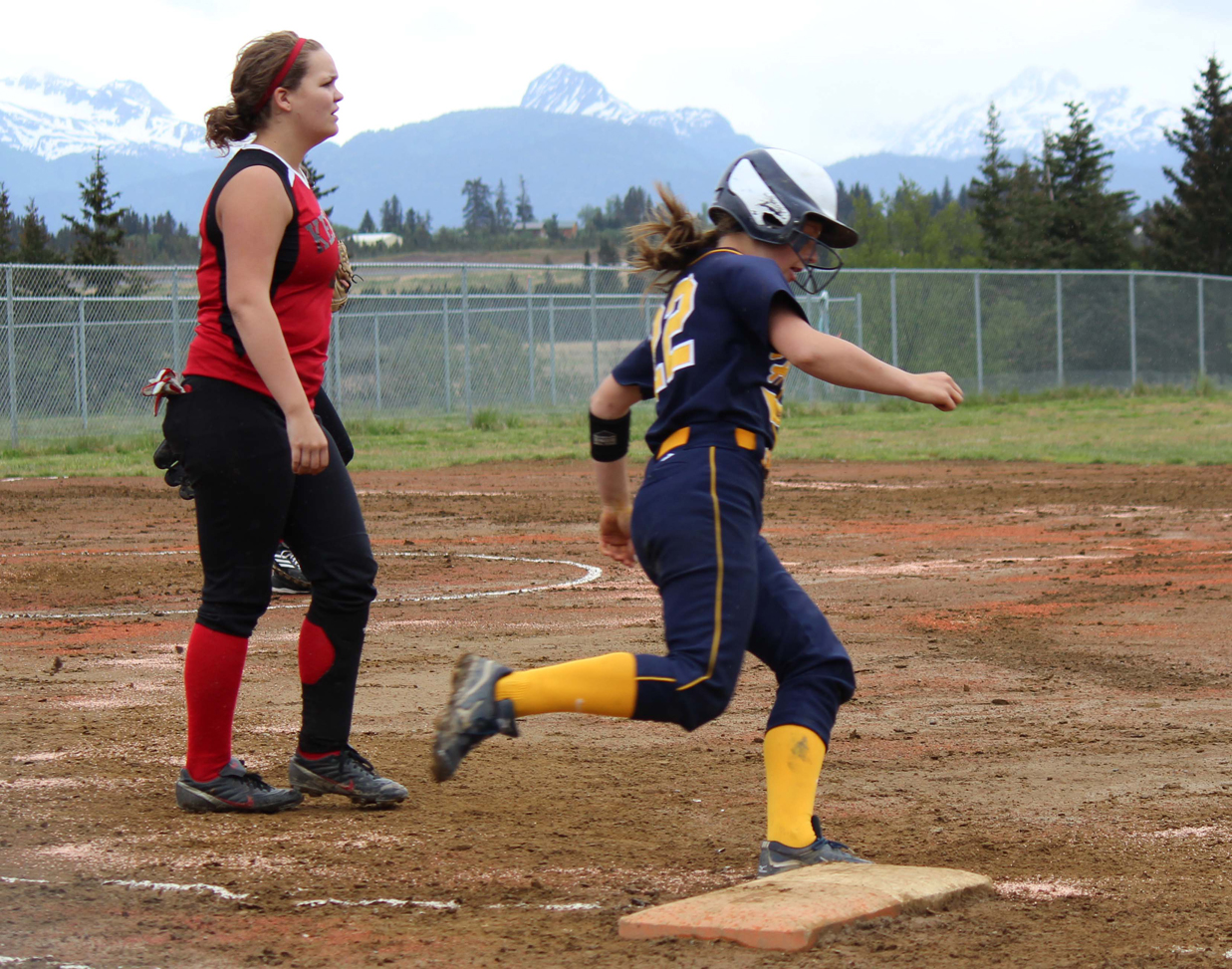 Mariner Maggie LaRue charges part first base during Monday’s game.-Photo by McKibben Jackinsky, Homer News