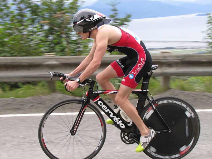 In the 2013 Homer Ironman Triathlon, Will Oviatt of Anchorage approaches the top of East Hill. Oviatt went on to finish fifth place overall.-Photo by Hal Spence