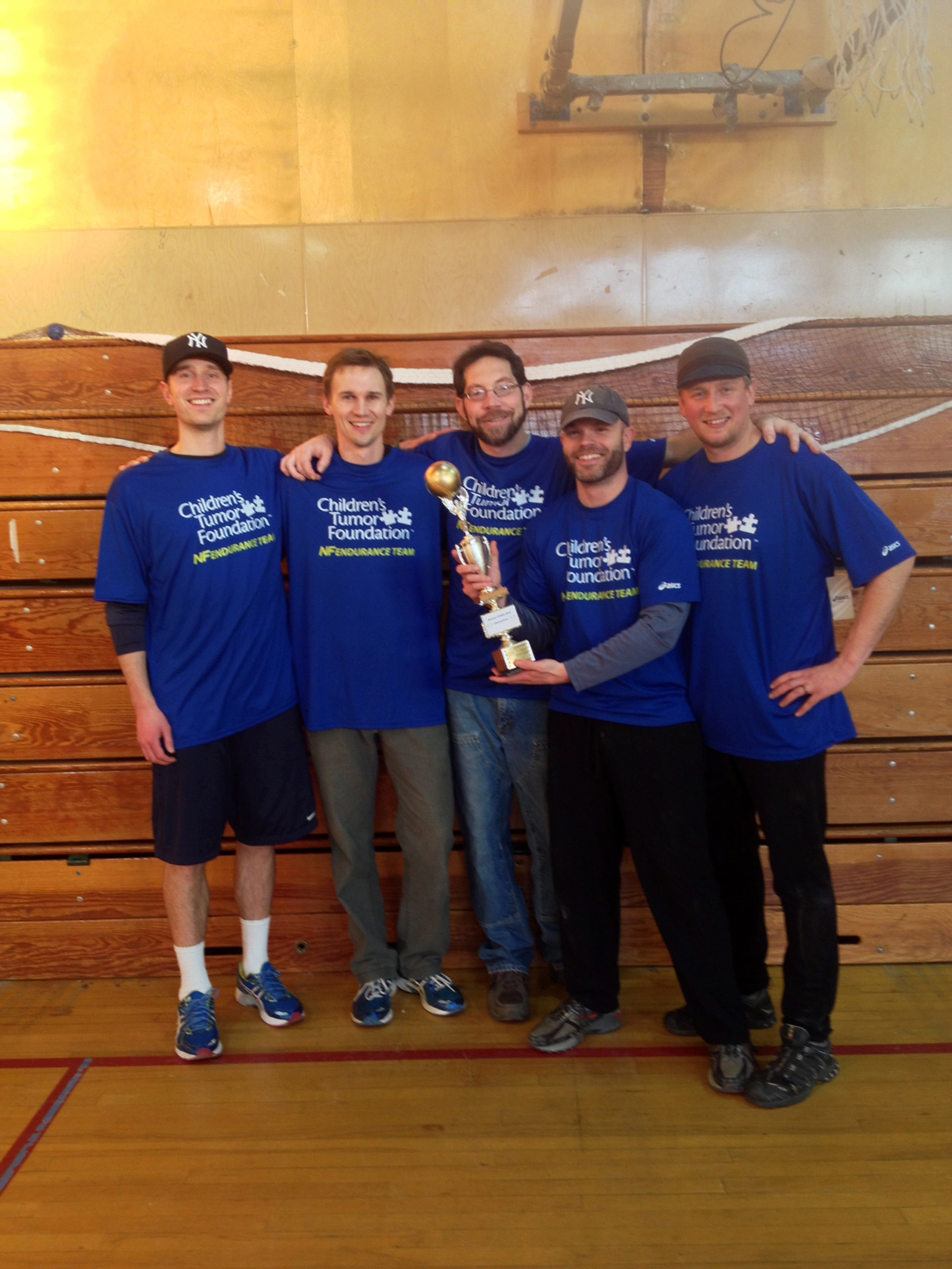Team Jobu’s Mark Putney, Dan Olson, Michael Mahmood, Campbell and Brandon Young accept the championship trophy. Also participating were the Master Blasters, Team Lowe and the High Lifers. -Photo provided