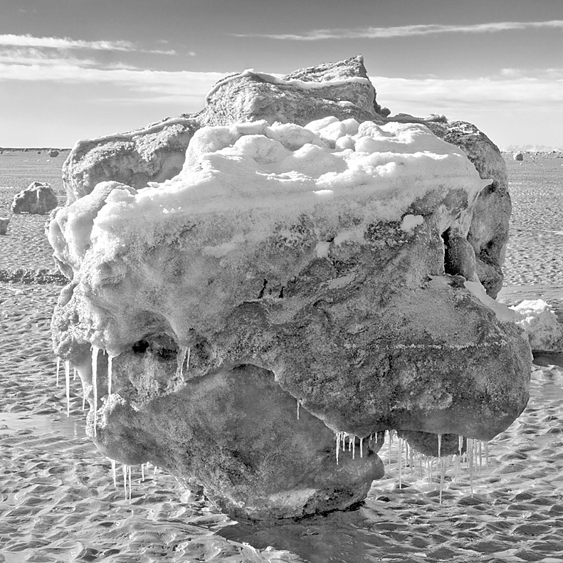 This photo of a stranded ice flow on Turnagain Arm at low tide is from the exhibit “Strangers” at Bunnell Street Arts Center.-Photo by Hal Gage