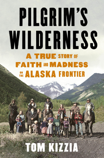 In a photo from the cover of “Pilgrim’s Wilderness,” Papa and Country Rose Pilgrim, center, are shown with their 14 children at their land near McCarthy.