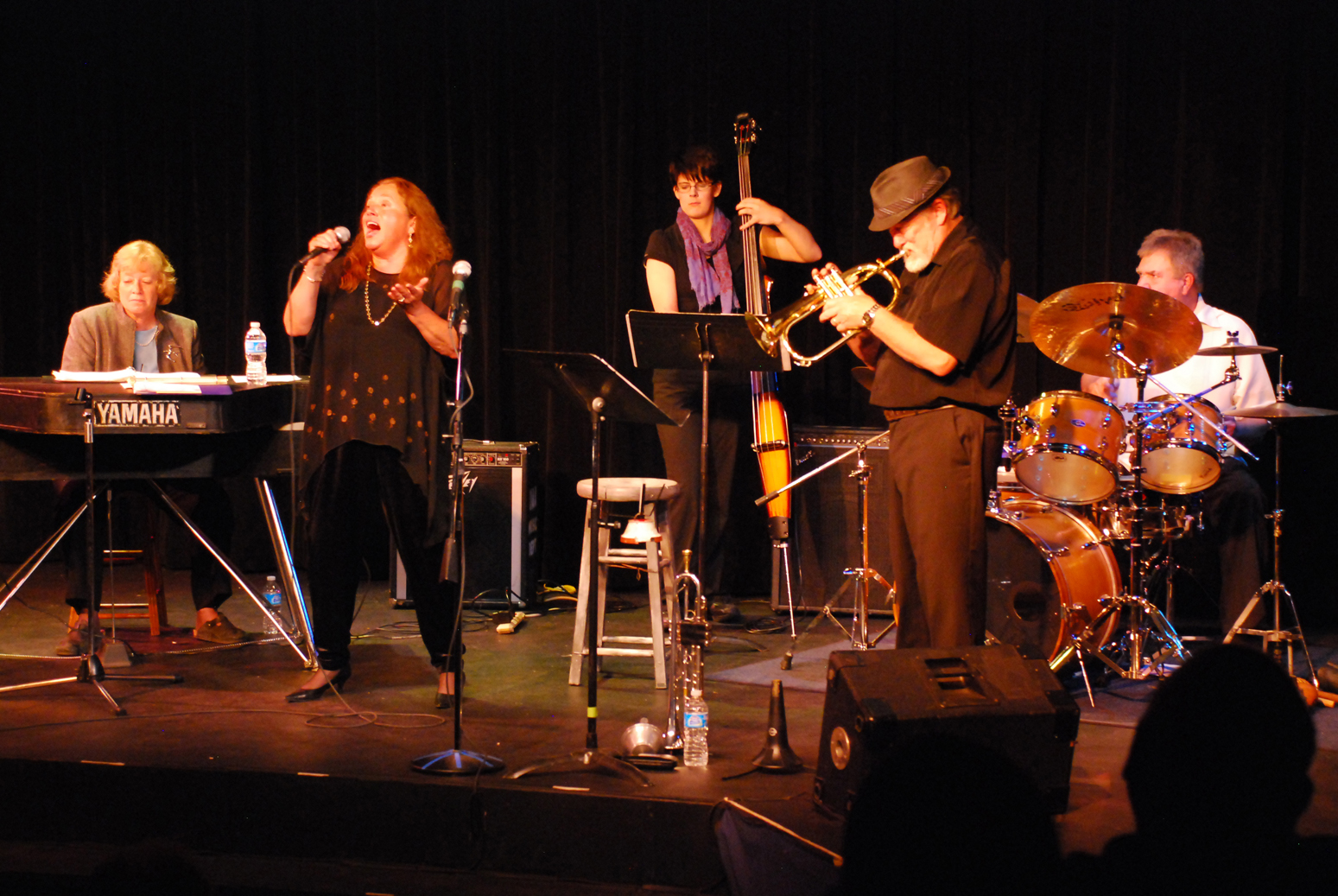 Outrageous Jazz performs in 2012 at Pier One Theatre. From left to right are Karen Strid-Chadwick, piano; Brenda Vulgamore Hune, vocals; Heidi Herbert-Lovern, bass; Dale Curtis, trumpet; and Curtis Bates, drums. Bates is not playing this year, with Cameron Cartland playing drums.  -Photo provided