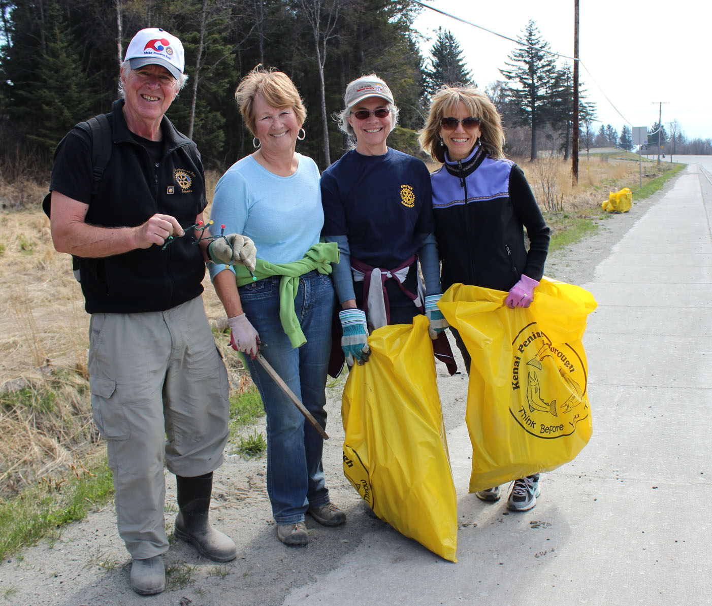 From left, Clyde Boyer, Lorna Olson, Vivian Finley and Sandy Eherenman of Homer Kachemak Bay Rotary, spend Saturday morning cleaning up the “Rotary Mile” along the Sterling Highway.-Photo by McKibben Jackinsky, Homer News