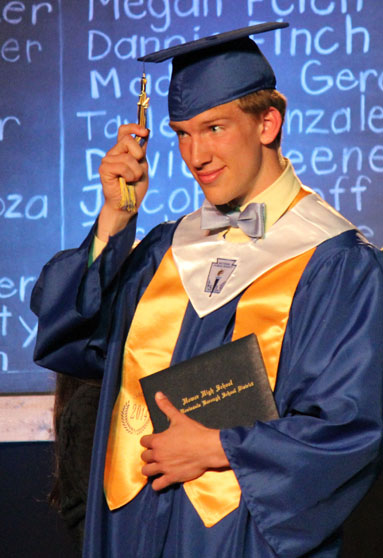 John Walsworth, valedictorian, completes his walk across the stage.-Photo by McKibben Jackinsky, Homer News