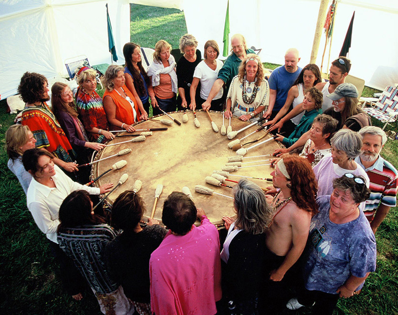 Visitors play the drum at “prayerformances” around the world.-Photo provided