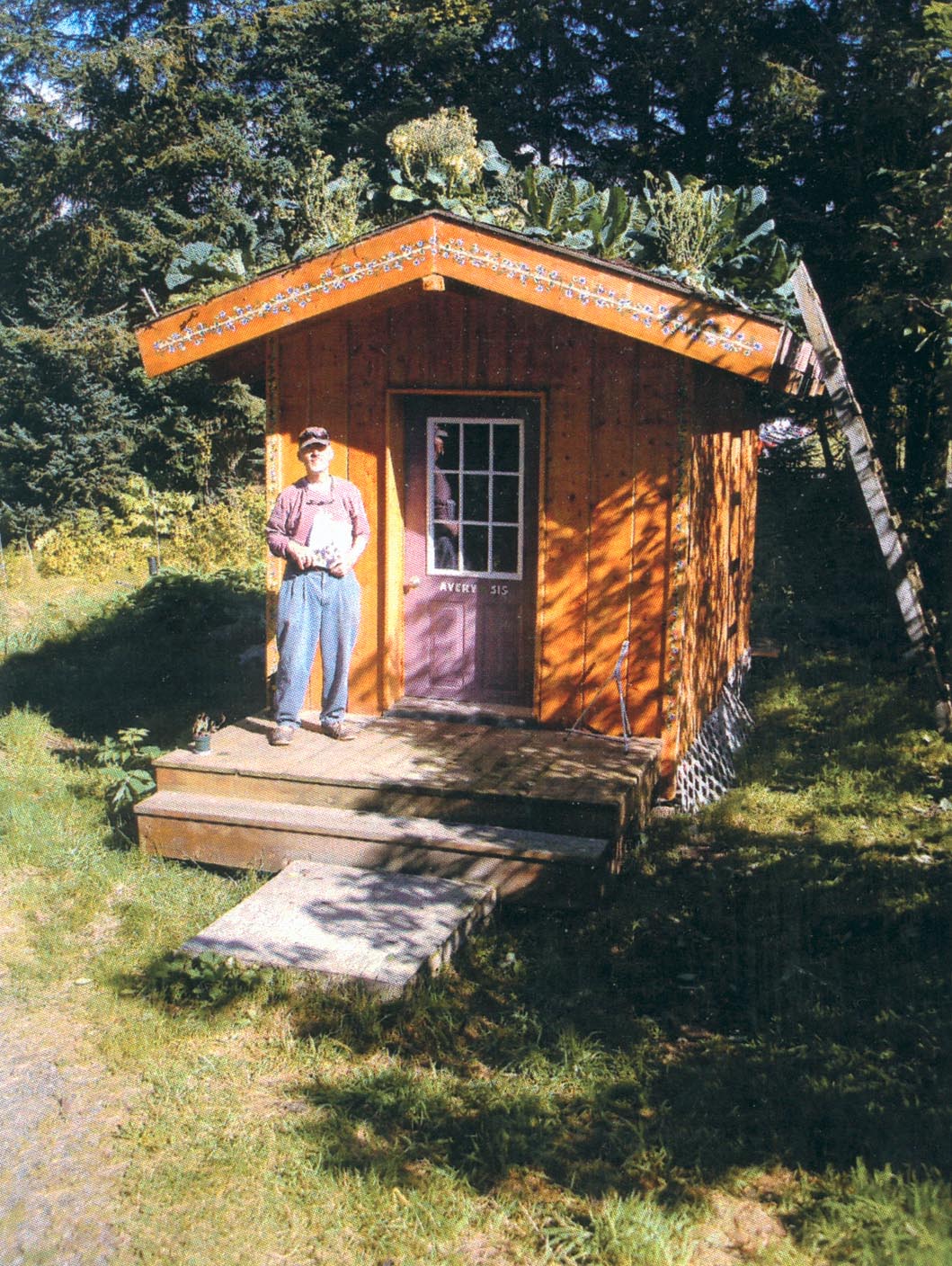 Jack Polster stands by his sod-roof cabin on Ocean Drive. -Photo provided