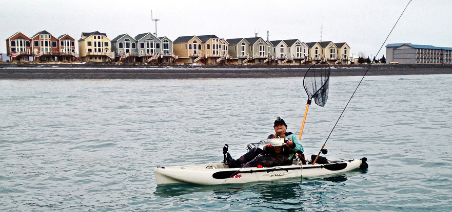 Rudy Tatsuda of Anchorage fishes for winter kings off the Homer Spit by kayak. This year’s winter king tournament has a category for kayaks.-Photo by Jim Lavrakas
