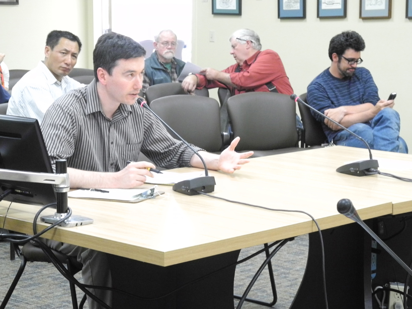 Land’s End chief financial officer Josh Garvey testifies on water-sewer rates at the Homer City Council.