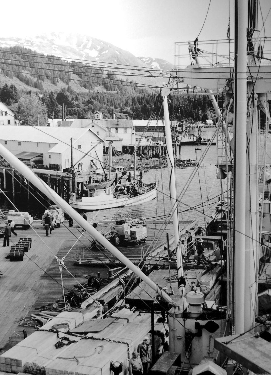 A large steamer offloads cargo at Seldovia Port during a long ago and busier time. The photo is believed to have been taken in the late 1940s or early 1950s.-Photo by William Wakeland, courtesy of the Selodvia Museum
