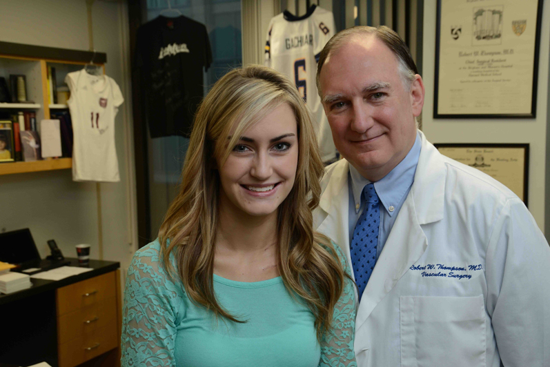 Marissa Paul of Homer poses with Dr. Robert Thompson, an expert in Thoracic Outlet Syndrome at the Washington University Center at Barnes-Jewish Hospital in St. Louis.-Photo by Timothy Mudrovic, BJC HealthCare