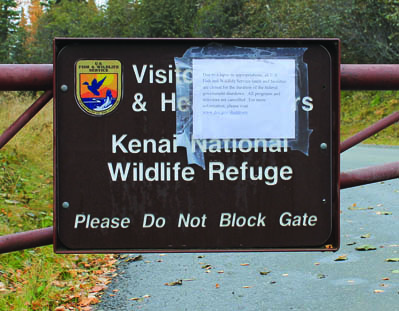 A notice posted on the gate at the Kenai National Wildlife Refuge visitor center and headquarters in Soldotna informs visitors that U.S. Fish and Wildlife lands and facilities are closed, and programs and activities canceled, due to a lapse in appropriations.-Photo by Will Morrow, Peninsula Clarion