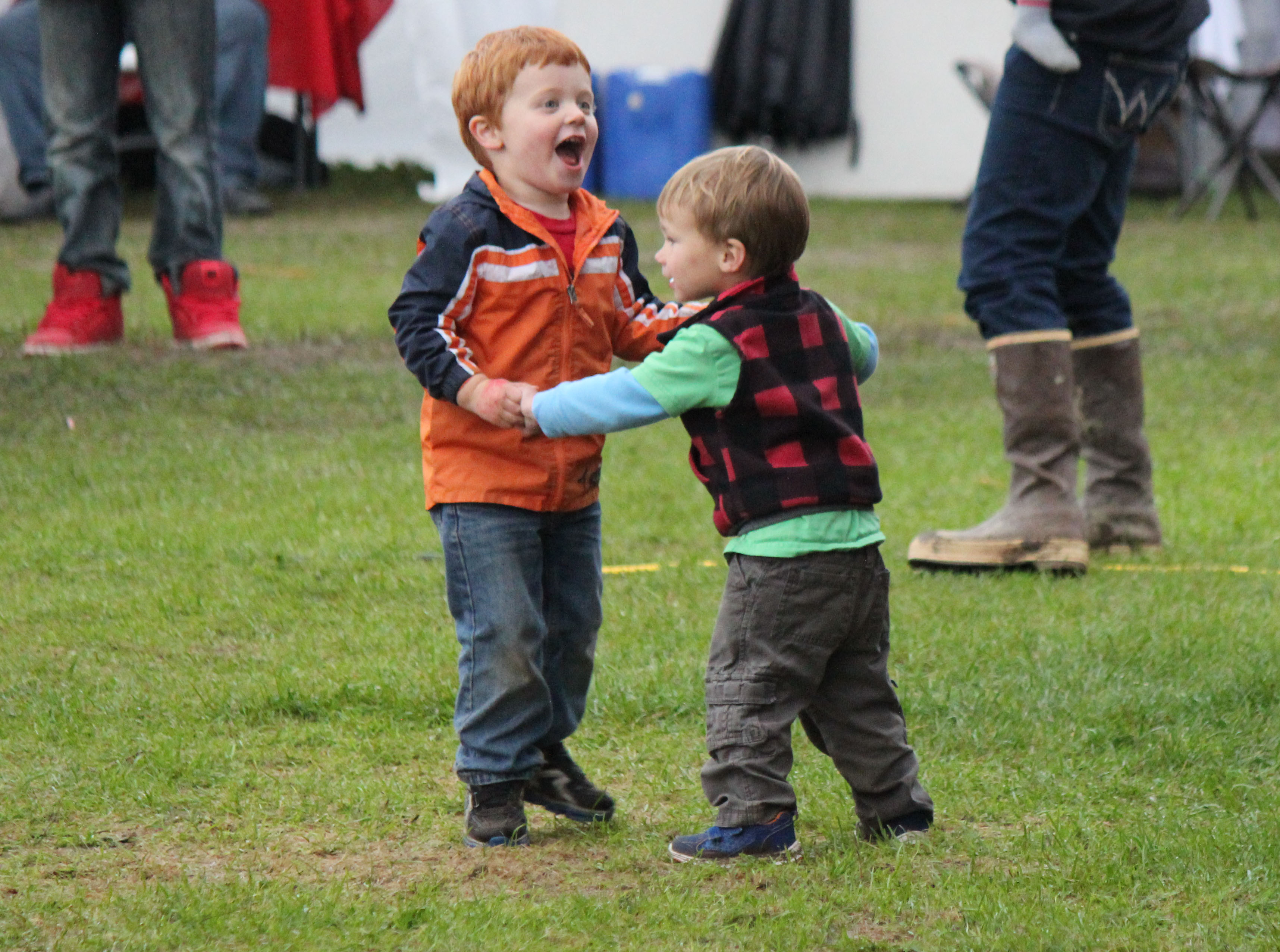Hank Geragotelis of Homer and Kellen Isenhour of Anchor Point dance to the music of Homer Free at the Kenai Peninsula Fair on Saturday night.-Photo by McKibben Jackinsky; Homer News