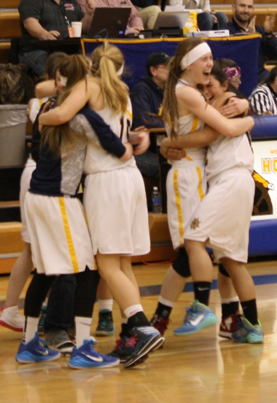 The Mariner girls basketball team celebrate their victory at Regions last weekend. The girls head to the State tournament next week.-Photo by Lindsay Olsen