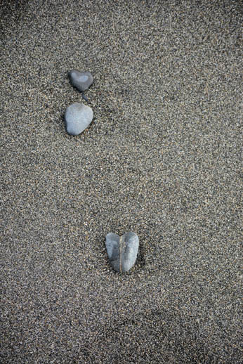 Heart-shaped rocks are exposed by the outgoing tide on the Homer Spit beach — nature’s own Valentine’s Day gift.-Photo by Michael Armstrong, Homer News