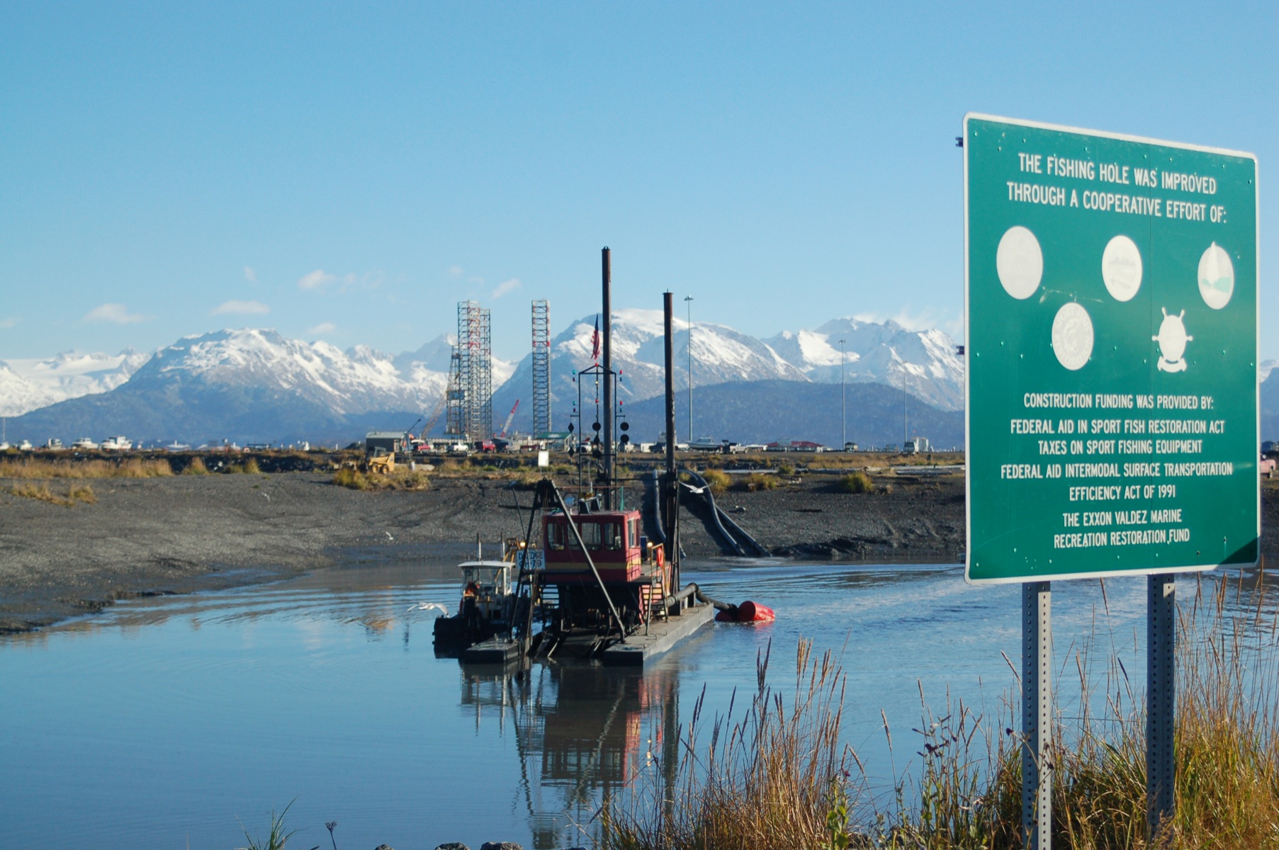 A city-contracted dredge works in the Nick Dudiak Fishing Lagoon last fall, returning it to the 12-feet-at-low-tide depth for which the lagoon was designed and constructed. -Photo by Michael Armstrong, Homer News