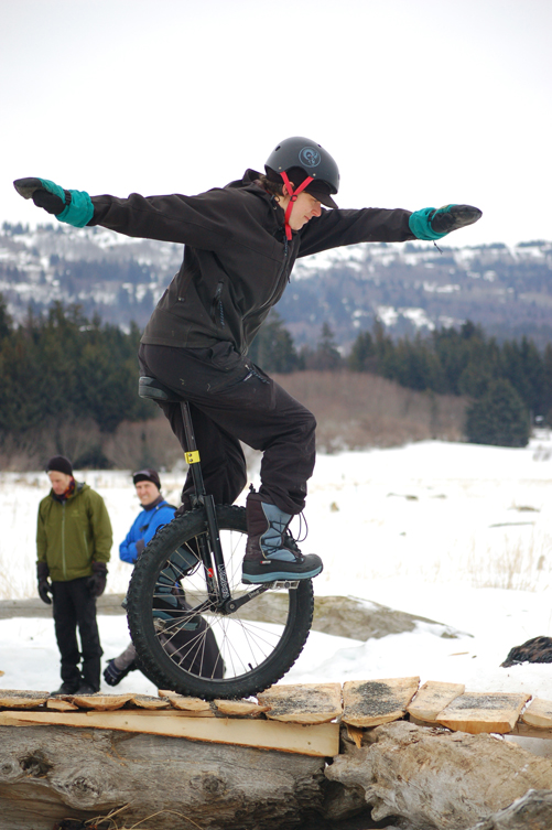 Kim McNett rides a rough-terrain unicycle on the obstacle course at the 2012 Homer Big Fat Bike Festival.-Photo by Michael Armstrong, Homer News