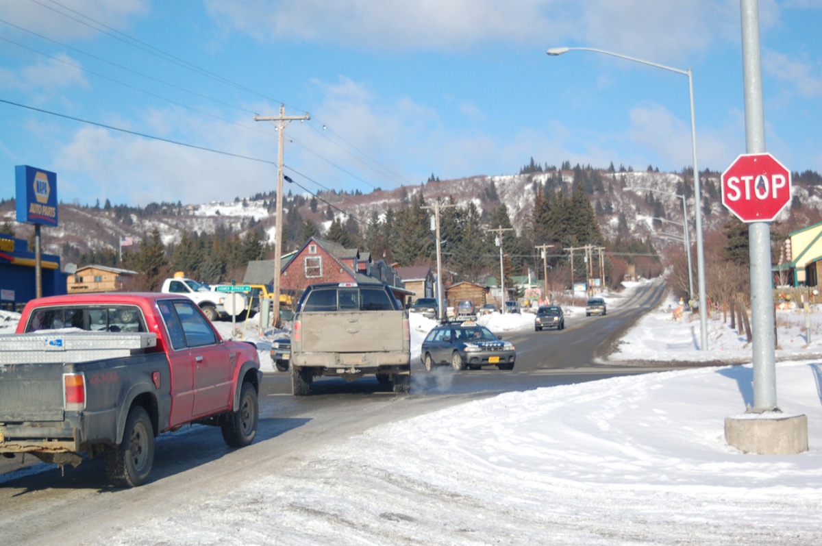 Traffic backs up at the Main Street and Sterling Highway intersection at mid-day last Friday. Crossing the highway or taking a left turn sometimes requires patience and nerves of steel.