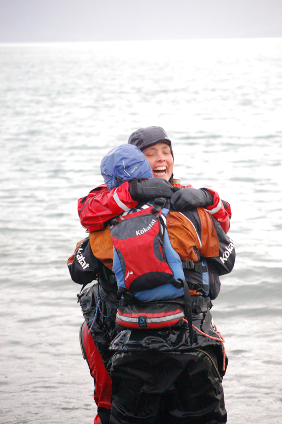 Sarah Outen hugs Justine Curgenven after they land on the Spit Aug. 14.-Photo by Michael Armstrong, Homer News