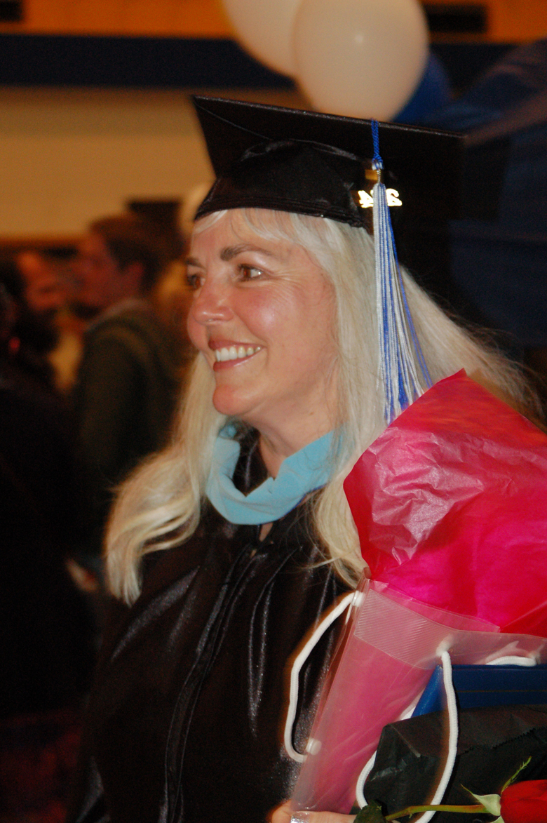 Lenore Swanson smiles after receiving her master of arts in teaching at Kachemak Bay Campus commencement May 7 at the Mariner Theatre.-Michael Armstrong, Homer News