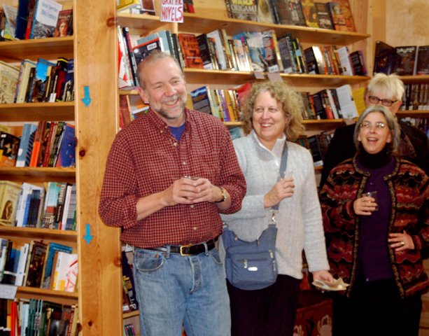 Kizzia celebrates with Sara Reinert, Rosemary Fitzpatrick and Michele Miller. The event was held at the bookstore.-Photos by Michael Armstrong, Homer News