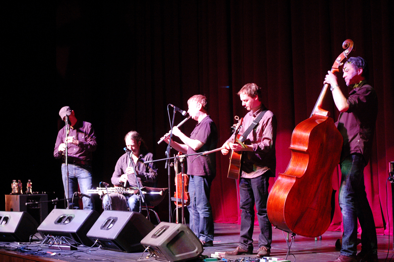 Lúnasa performs at the Mariner Theatre last Saturday. From left to right are Kevin Crawford, Cillian Vallely, Seán Smyth, Ed Boyd and Trevor Hutchinson on double bass.-Photo by Michael Armstrong, Homer News