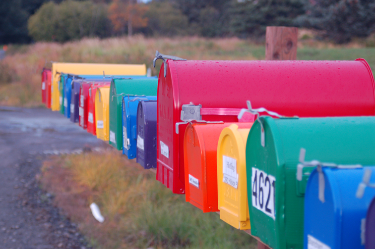 A row of painted mailboxes brighten up the neighborhood on Hillside Place off West Hill Road.-Photo by Michael Armstrong, Homer News