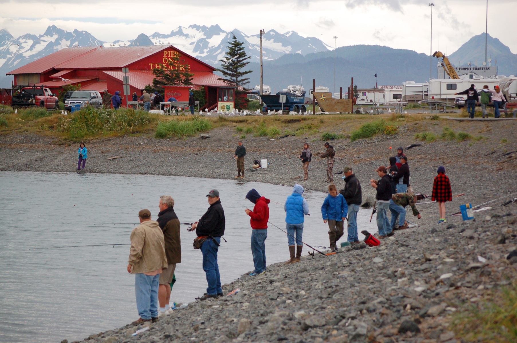 Fishermen work the incoming tide on Thursday afternoon at the Nick Dudiak Fishing Lagoon on the Homer Spit.-Photo by Michael Armstrong, Homer News
