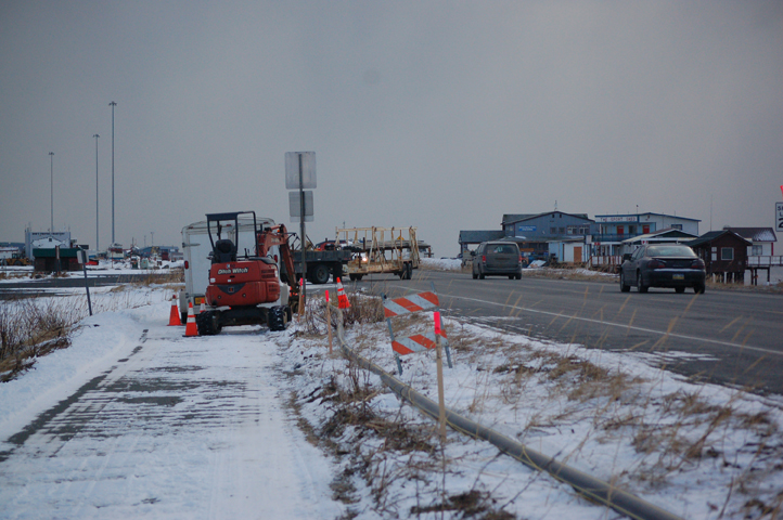 Despite 15-degree cold last Thursday, contractors worked on extending the natural gas pipeline out to the end of the Homer Spit.-Photo by Michael Armstrong, Homer News