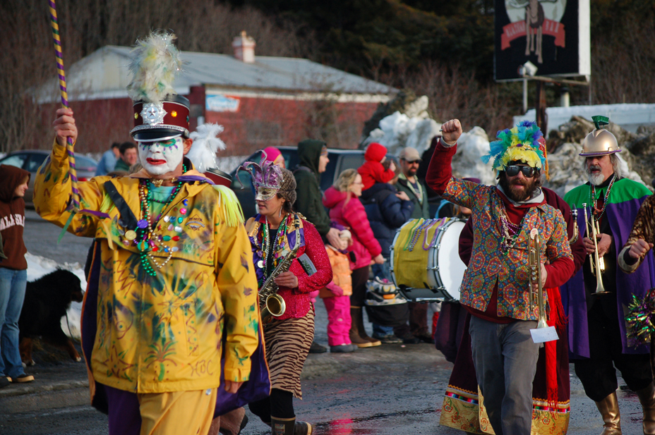 Band members of the Krewe of Gambrinus Social Aid and Pleasure Club march in the 2012 Homer Winter Carnival Parade.-Photo by Michael Armstrong, Homer News
