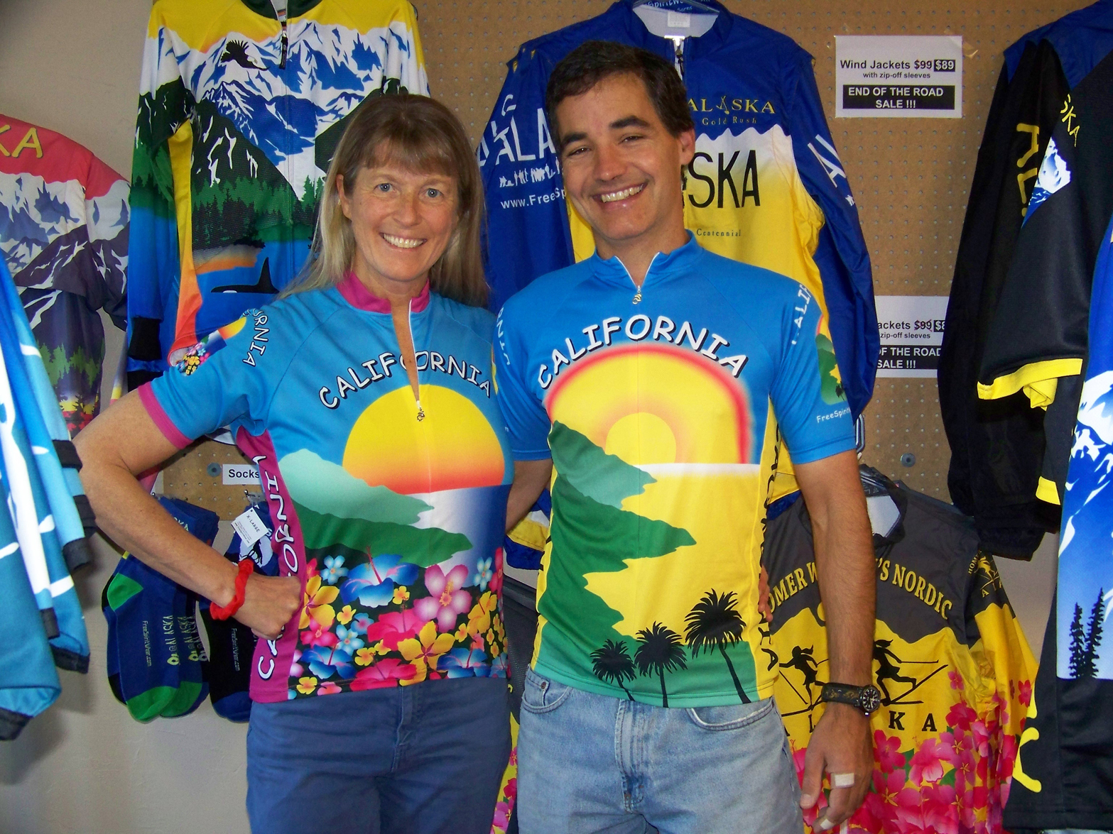 Kathy Sarns, left, and Pat Irwin model the “California” bike jersey Sarns designed and sells through her business, Free Spirit Wear. The men’s version, worn by Irwin, is worn by actor Paul Rudd in the recently released movie, “This is 40.”-Photo by McKibben Jackinsky, Homer News