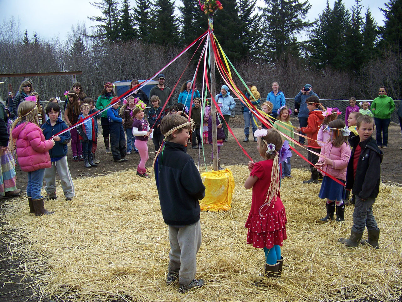 An early morning snowfall and chilly temperatures weren't enough to dampen the May Day Celebration at Fireweed Academy on Saturday. Crafts, a silent dessert auction, musicians and a May Day dance performed by the charter school's younger students kept the festivities going.-Photo by McKibben Jackinsky, Homer News