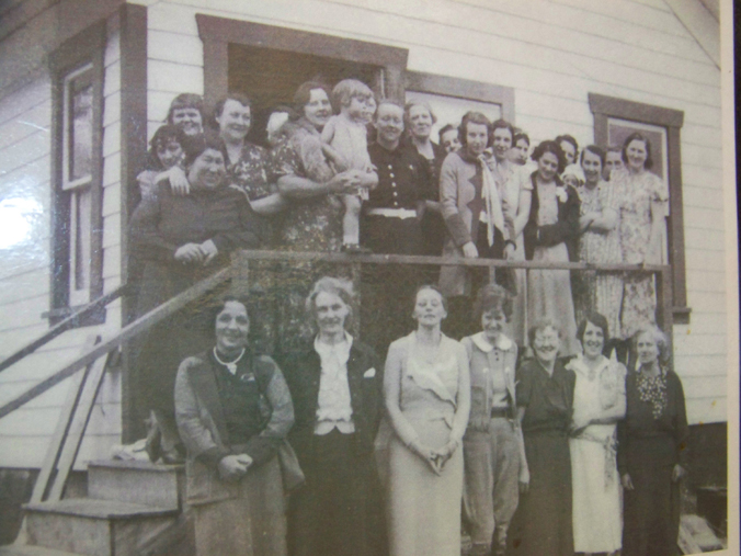 This Pratt Museum photo, on display at the Homer Airport, shows the first group of Homer homemakers who banded together to support and learn from one another.-Pratt Museum