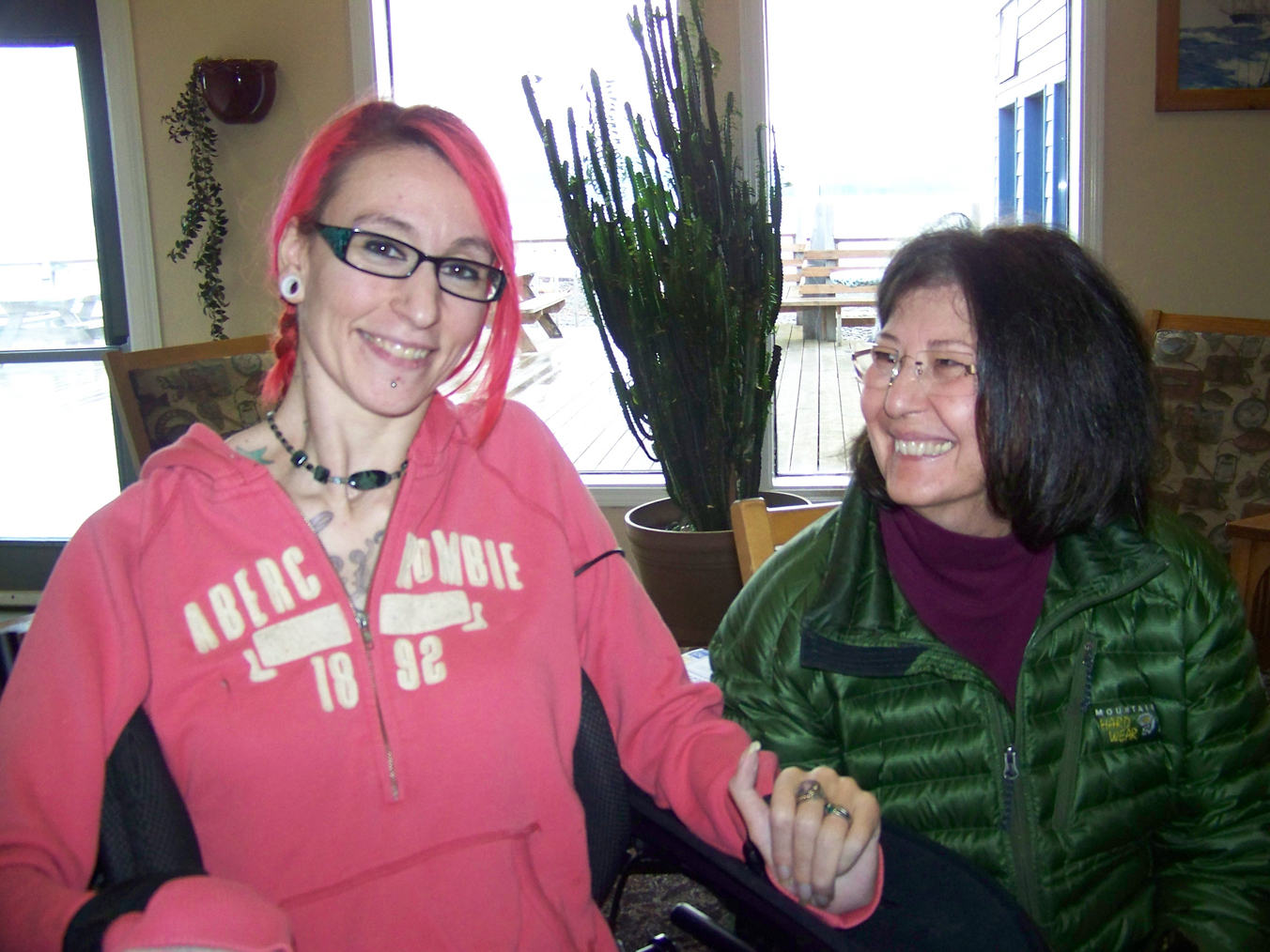 Artist Maggie Winston of Kenai, left, and Homer author Marianne Schlegelmilch, right, pair up to create “Slugs Forever,” a children’s book the Independent Living Center will use as a fundraiser.