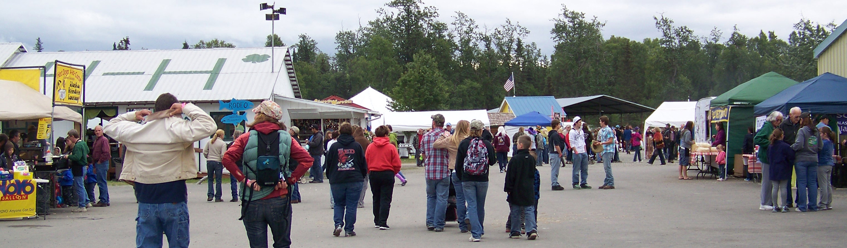 Visitors walk the grounds last year at the Kenai Peninsula Fair. The annual August tradition opens at 9:30 a.m. Friday and runs through Sunday. The fair closes 9 p.m. Friday and Saturday and 5 p.m. Sunday. This year’s theme is “Clammin’ It Up.” Admission is $10 a day for adults, $5 for youth 6-12 and seniors 65 and older or a three-day pass for $25 adults, $10 youth and seniors. Friday is Red Shirt Friday to “remember everyone deployed.” Back this year are the popular pig races. For a fair schedule, go to kenaipeninsulafair.com.-Photo by McKibben Jackinsky, Homer News