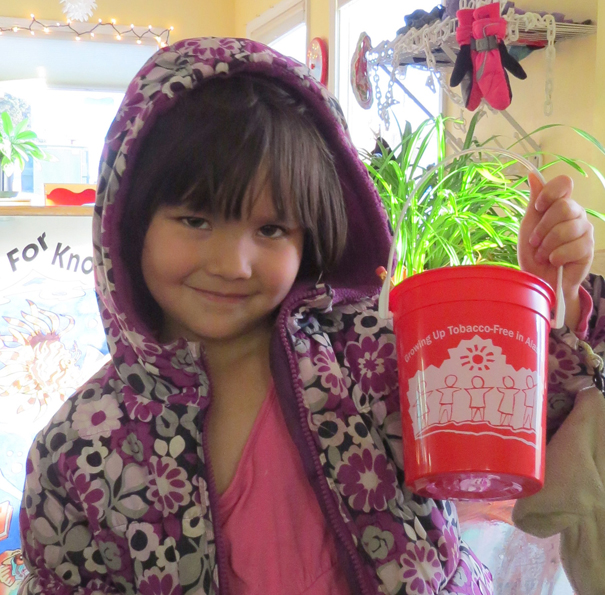 Marina Co shows off her “Growing Up Tobacco-Free in Alaska” bucket.-Photo provided