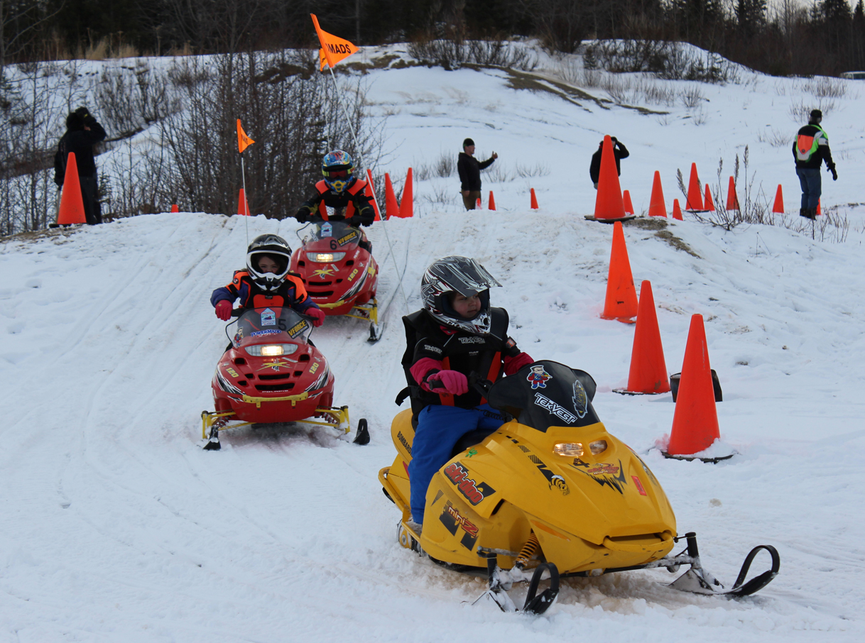 Youngsters take part in the Snow Rondi snowmachine activites. -Photo by McKibben Jackinsky, Homer News