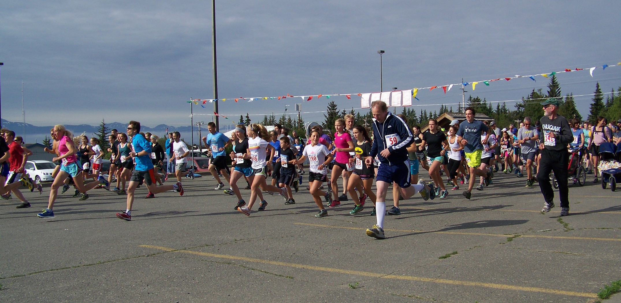 More than 300 participants are off and running at the start of the 10K to the Bay Spit Run.-Photos by McKibben Jackinsky, Homer News